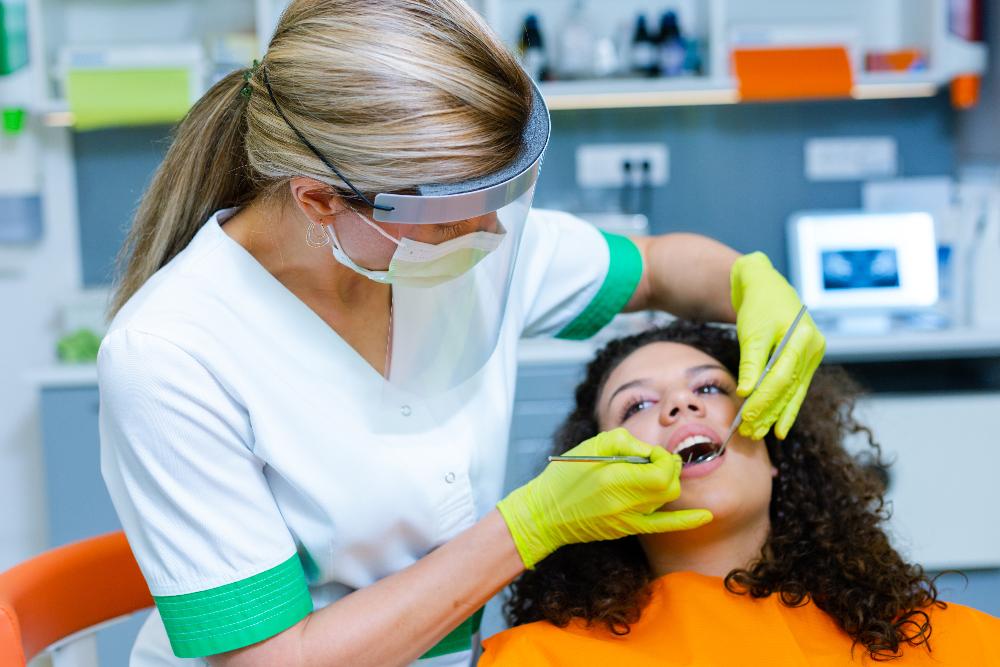 dentist working with patient | emergency dentistry clifton hill vic
