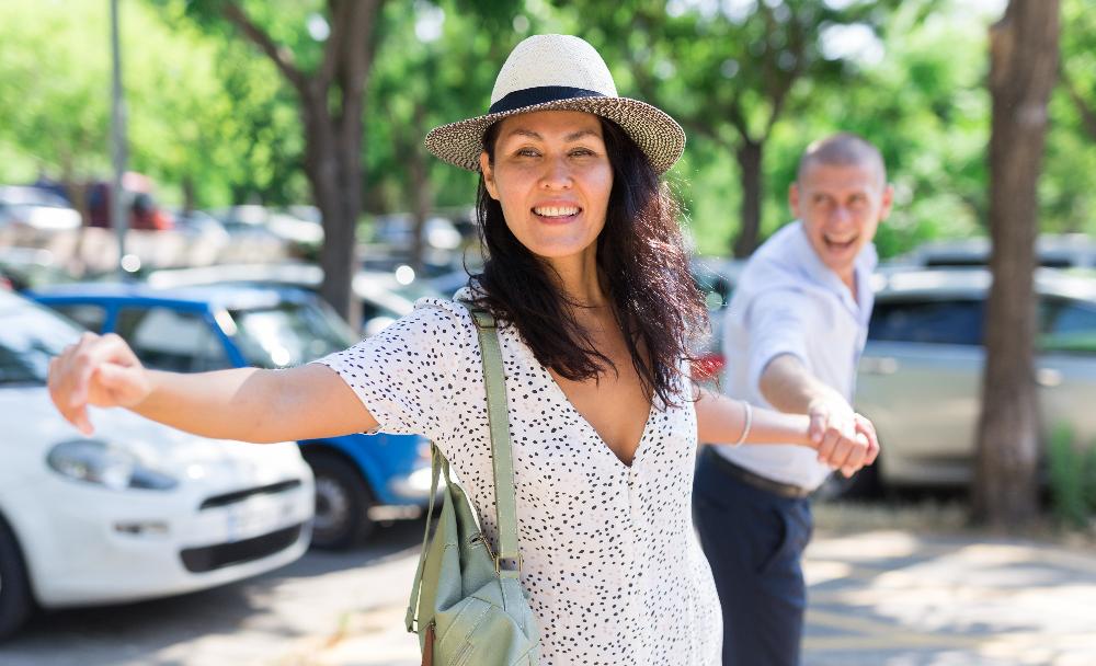 woman in hat smiling | dental implants thornbury