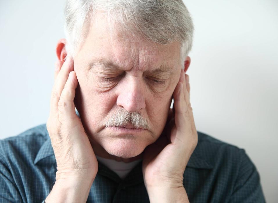 man having jaw pain from TMJ | TMJ treatment clifton hill