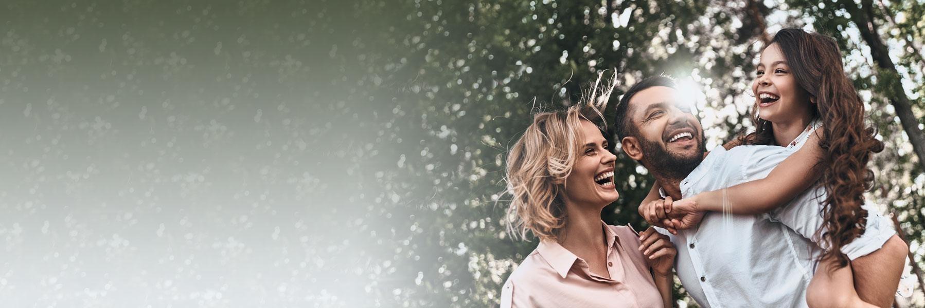 young family of three smiling l dentist thornbury