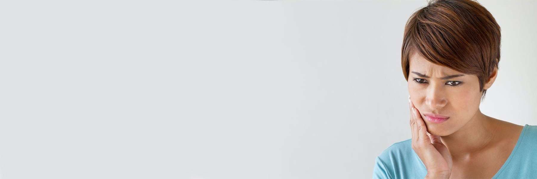 A woman with tooth pain