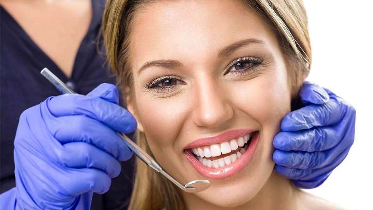 woman smiling in dentist chair | dentist clifton hill vic