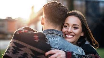 young couple hugging l cosmetic dentist thornbury