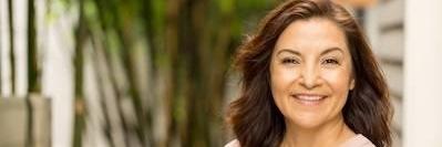 woman with brown hair smiling l northcote dentist