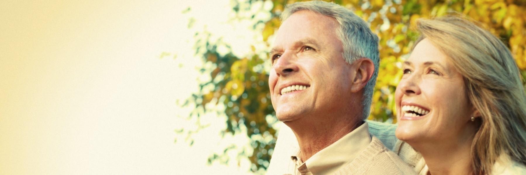 Older man and woman smiling | All-on-4 clifton hill